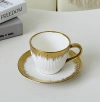 Taza de café taza de té de cerámica dorada luz lujo oro negro hogar inglés té de la tarde juego de té alto nivel de apariencia exquisito conjunto de tazas y platos Item Picture